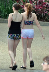 Couple of cute girls in wet shorts with decent asses