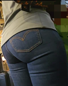 Juicy MILF in tight dark blue Jeans.