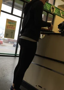 Thick booty girl shopping at Dollar Tree in leggings
