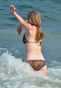Cheetah print bikini blonde at the beach with nice body
