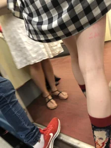 Cute Skinny Teen in Knee-Socks And Shorts Sitting With Crossed Legs in a Subway Train Creepshots Gallery