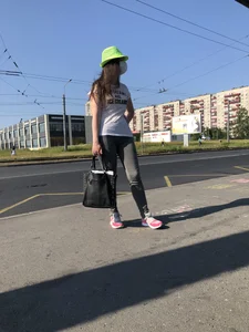 Nice candid girl wearing tight grey sweatpants, a mask and a hat