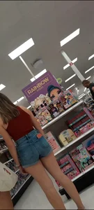 Petite girl filling out her short jean shorts