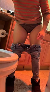 Candid girl with pulled down jeans gonna go to the toiled home creepshot