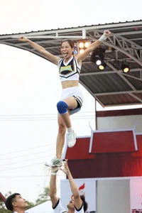 Bunch of athletic Thai cheerleaders at a competition