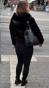 Stocky Girl in Tight Pants Standing on Crosswalk Street Creepshot