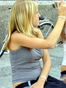Two girls showing some of their panties while sitting