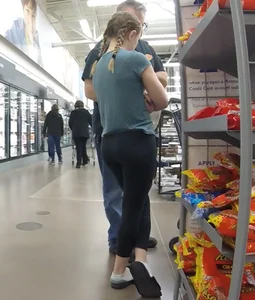 Pigtail teen at the supermarket