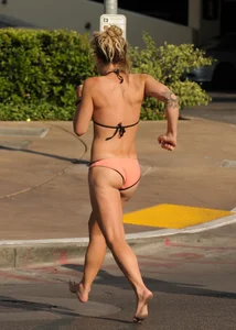 Sexy blonde with a nice ass in a peach bikini
