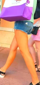 Candid girl in denim shorts with nice legs and showing her cheeks