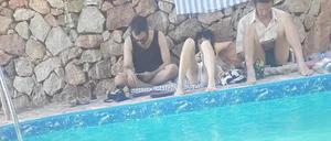 Very skinny girl by the pool