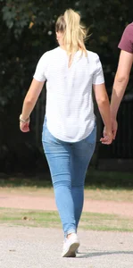 Blonde chick walking with her boyfriend in tight jeans