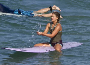 Candid surfer babes on the beach and in bikinis