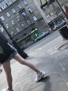 Candid Teen in Denim Shorts And Sneakers With Slim Legs Street Photos