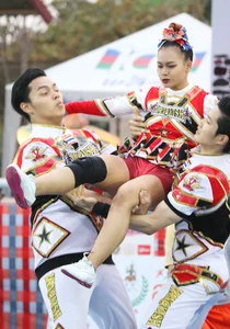Bunch of athletic Thai cheerleaders at a competition