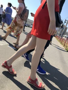Girl in a Red Dress and Sandals With Thin, Pale Legs on the Crosswalk City Creepshots Gallery