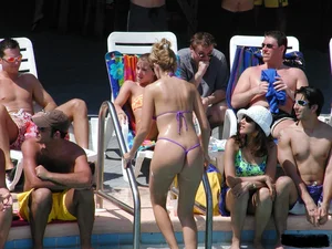 Beach voyeur girls in bikinis, thongs and topless