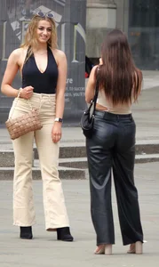 2 girls in jeans & leather pants with nice butts & visible nips