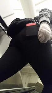 Girl in Black Pants on the Escalator with Spread Legs Creepshot