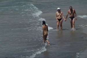 Girls on a nude beach in Sitges, Spain