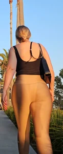 Pair of bootys in leggings walking