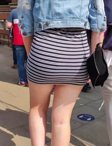Redhead squeezed into a tight dress