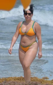 Chubby white girls in bikinis on the beach