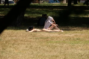 Creepshots of some girls in the park getting some sun in bikinis