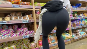 Slim Cutie Bends Over in Black Leggings