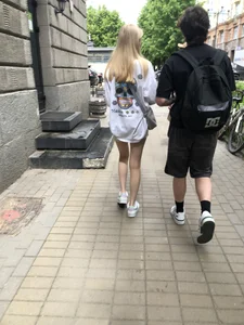 Blonde candid teen in shorts with hot slim legs street creepshots