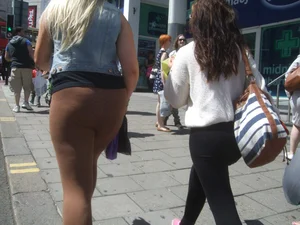 Thick blonde showing her panties in see through leggings