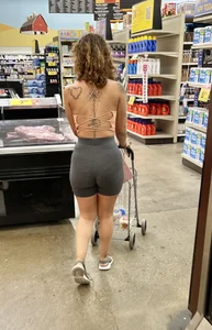 Tiny Latina in tight spandex shorts