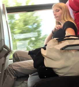 Hot busty blonde on train