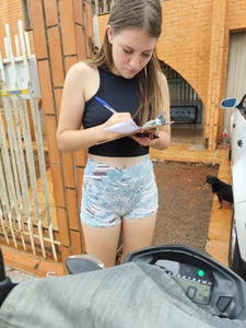 Skinny blonde receiving her order with her cameltoe swallowing her volleyball shorts