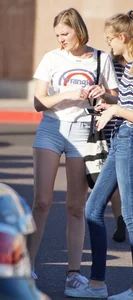 College babe in the parking lot in little denim shorts
