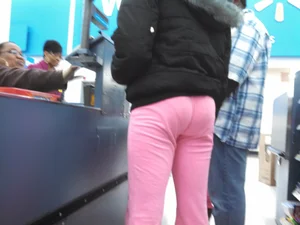 Ebony girl with a cute booty and vpl in pink sweats at Walmart