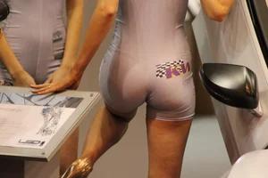 Car show models in spandex short suits with cleavage and camel toe