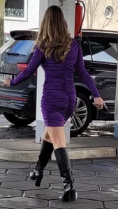 Hot girl in a short dress and boots street pics