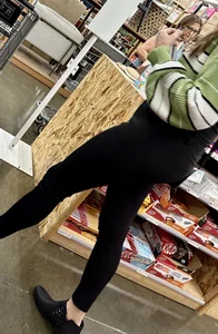 Great ass on this cutie with bangs, bending over and squatting down