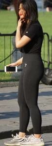 Cute Asian girl in tight leggings with a nice ass
