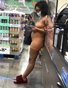 Latina with hard nipples and a big booty in tight spandex shorts outfit