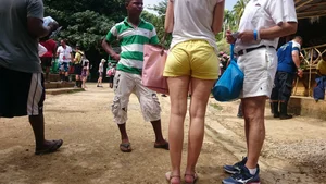 Milf in yellow shorts with vpl and a wedgie