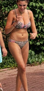 Hot big boobed girl in bikini at the pool