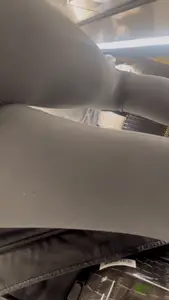 Tight curvy latina at airport pulls up pants