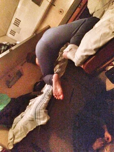 Teen in Track Pants in a Sleeping Train Car Candid