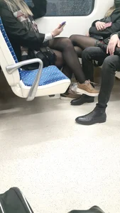 Crossed legs in black pantyhose, public transport creepshots