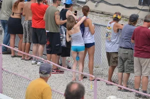 Skinny babe with a cute little ass in tiny blue shorts