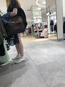 Hot Girl with Pale Skin in a Store Wearing Blue Denim Shorts Creepshots
