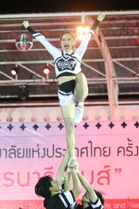 Bunch of athletic Thai cheerleaders at a competition