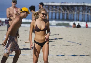 Hot candid girl playing beach volleyball in a swimsuit and sunglasses creepshots